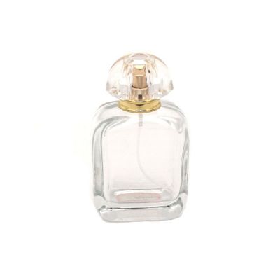 china factory 100ml transparent perfume refillable glass bottle with surlyn cap
