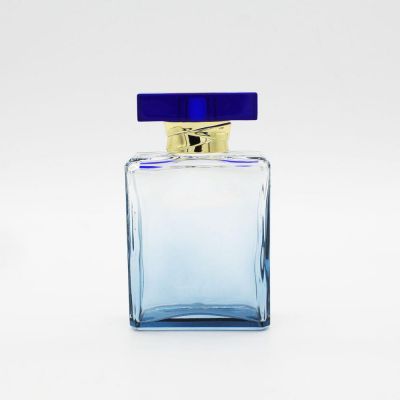 wholesale luxury fancy shiny sliver cap blue clear empty 100ml perfume glass bottle