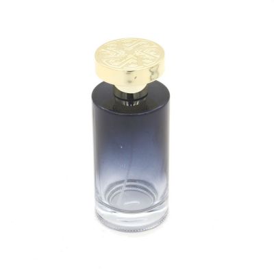 100ML custom cylinder blue glass spray bottle new design for perfume bottle with luxury gold lid 