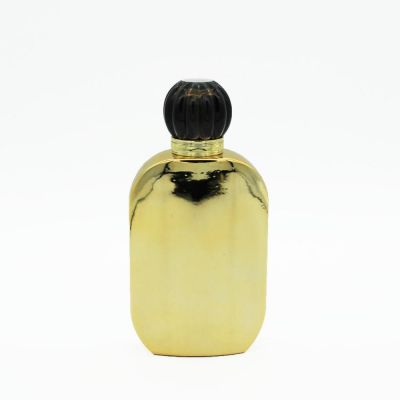 high end fancy luxury opague shiny gold UV coating empty 100ml perfume glass bottle