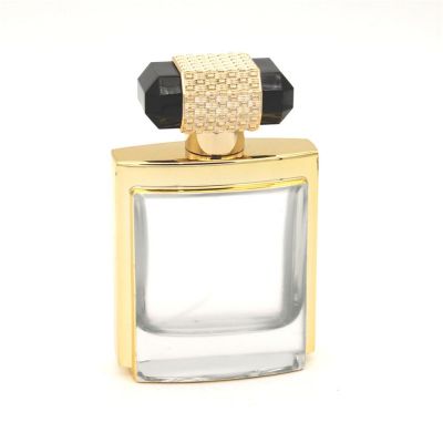 100ml uv coating gold perfume bottles factory luxury perfume bottle with luxury gold cap 