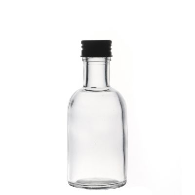 Wholesale Drink Packaging High Quality Spirit Round Clear Liquor Bottle with Lids 