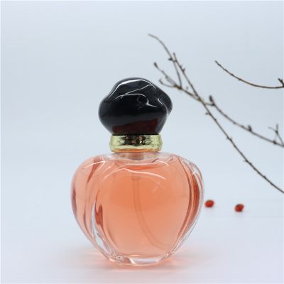 Customize special ball shape glass empty perfume bottles 35ml with pump spray