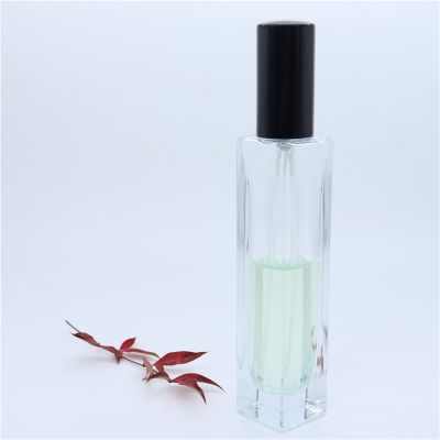 Customize 55ml Slender shape empty perfume bottles glass spray bottle with lid