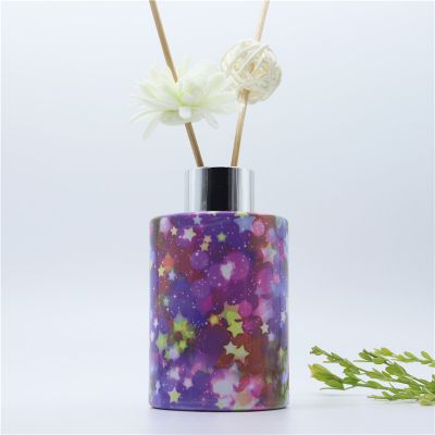 Hot sale 140ml purple star decal luxury glass diffuser bottle with rattan