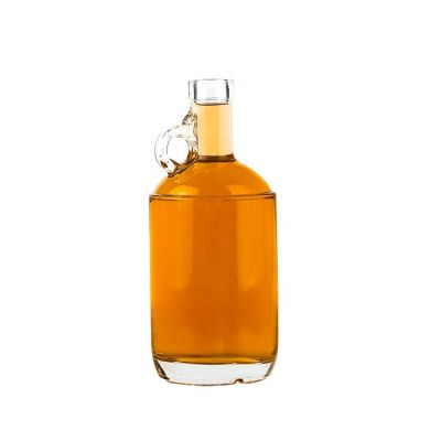 Custom-made transparent 750ml glass bottle with wooden stopper and handle