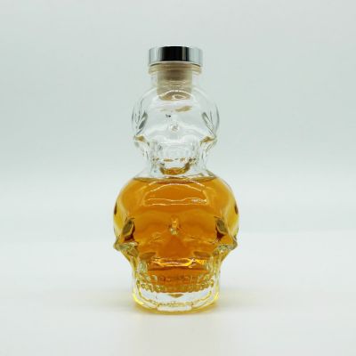 wholesale 200ml small skull glass bottle liquor vodka whisky skull glass bottle with cork