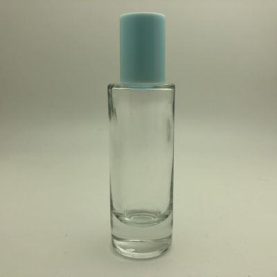 Popular lower MOQ factory price cylinder round 30ml perfume refill bottle in stock