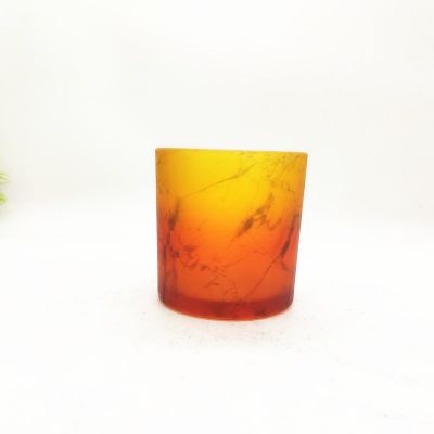 A classic glass candle holder for a large-caliber imitation marble dark red mature man