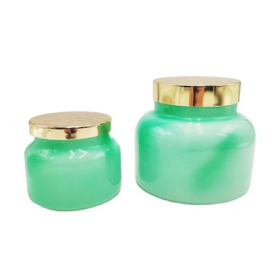 Jade green glass candle jar with hammer effect metal lid
