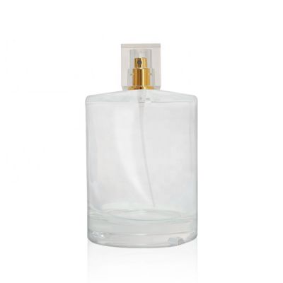 empty 100ml clear cylinder glass perfume bottle packaging with gold aluminum sprayer