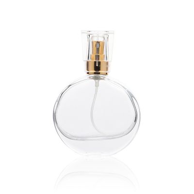 Wholesale 30ml Round Flat Clear Glass Perfume Bottle Brand New Decorative Parfum Spray Bottle with Protective Silver Frame