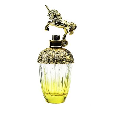 Custom Luxury 100ml Gold Gradient Spray Perfume Glass Bottle With Gold Unicorn Shape Lid