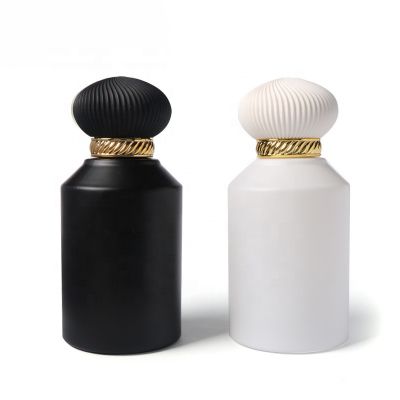 China Customized Luxury 75Ml Perfume Bottle Round Perfume Glass Bottles Black White Perfume Bottle