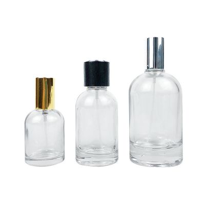 Wholesale 30ml 50ml 100ml Custom Transparent round glass bottle perfume spray bottles with lid