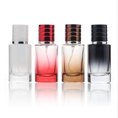 wholesale perfume spray bottles luxury glass cylindrical 30ml glass perfume bottle empty colored glass bottle perfume