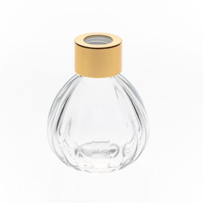 Hot Sale Customize Clear 100ml Round Ball Reed Embossed Flower Diffuser Glass Bottle