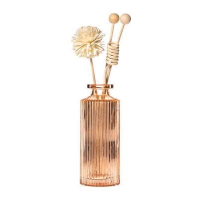 Fast Delivery Luxury 150ml Colored Embossed Reed Diffuser Glass Bottle With Wood Balls