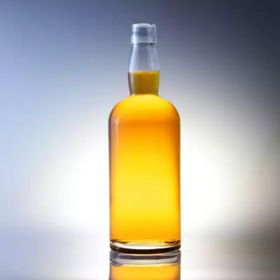 Manufacturer Good Quality 700ml Glass Bottle Weight for Whiskey Liquor Bottle from China