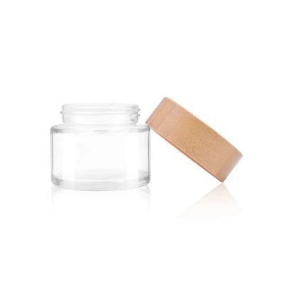 Hot sale 75ml clear cosmetic cream wide mouth flower glass jar with bamboo child resistant lid