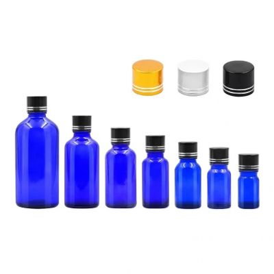 Wholesale varies specifications blue recycled Essential oil glass bottles with aluminum screw cap