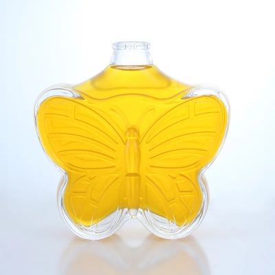 Custmozied butterfly shape 500ml vodka rum whiskey glass bottle with cork
