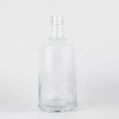 Custom Capacity High Quality Empty transparent round flint glass liquor Whisky Vodka tequila bottle with sealed cork lid
