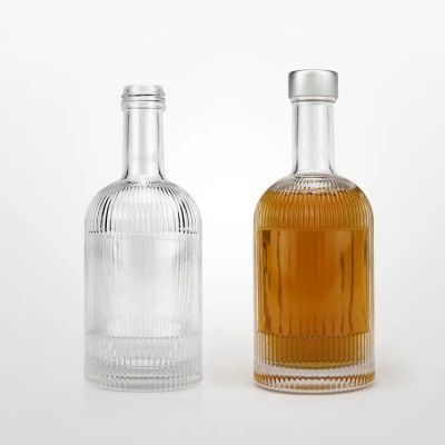 Wholesale custom 750ml round empty clear whiskey 330ml liquor spirit vodka glass bottle