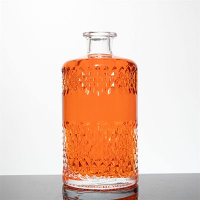 Factory Wholesale 500ml 700ml 750ml Custom Embossed Engraving Bourbon Whiskey Vodka Gin Glass Bottle with Custom Logo