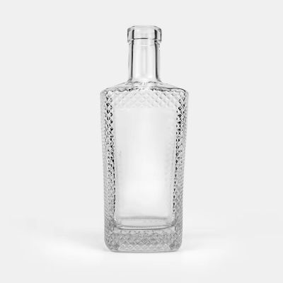 Custom Embossed Transparent Square Empty Flint 700ml Glass Liquor Wine Whisky Vodka Tequila Bottle With Cork Lid