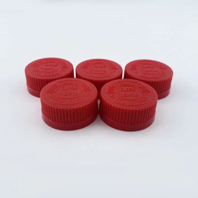 Ribbed 32 mm CRC caps safer for child use press twist caps low price plastic capsule bottle caps