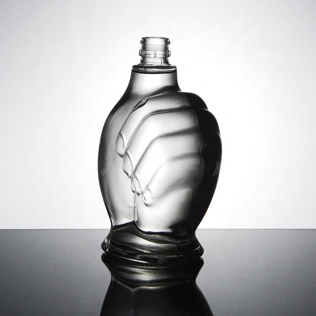 customized unique shape embossed glass liquor bottles