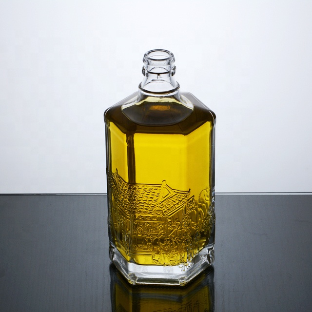 custom Hexagon shape 500ml glass bottle with emboss on bottle body