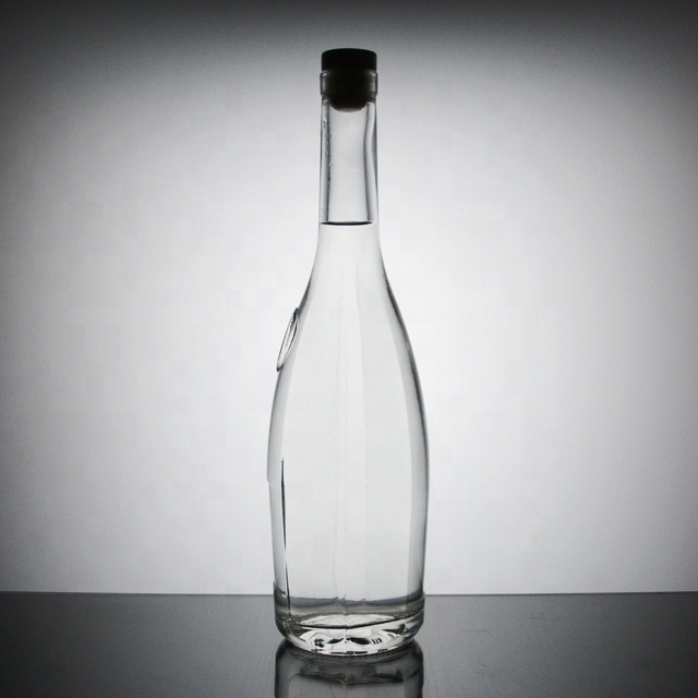 custom top quality 750ml round bottom ebossed glass bottle for whisky