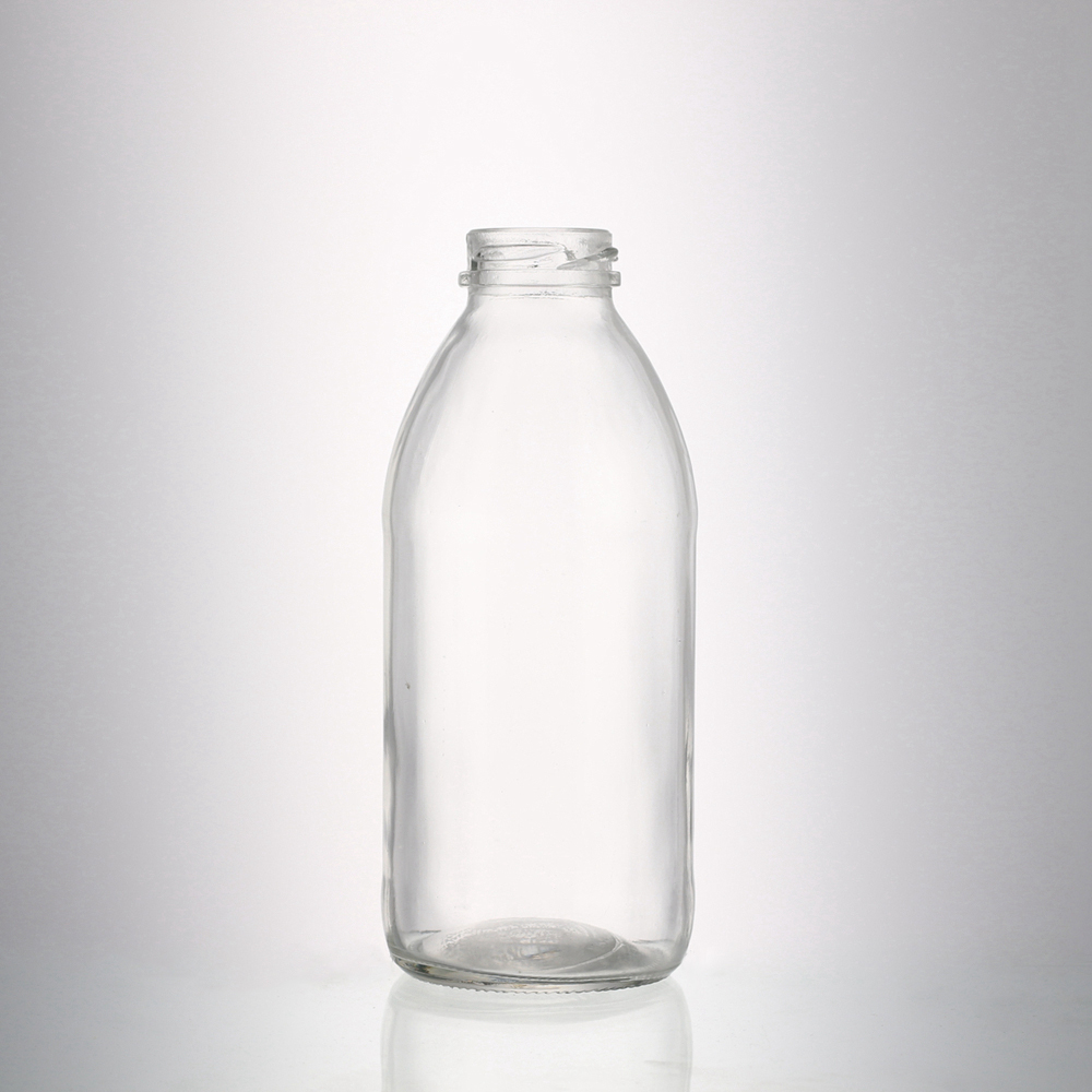 Cheap price 500 ml round shape clear Glass milk juice bottle for sale