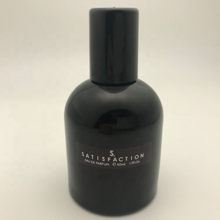 Men's cologne in top black round bottle