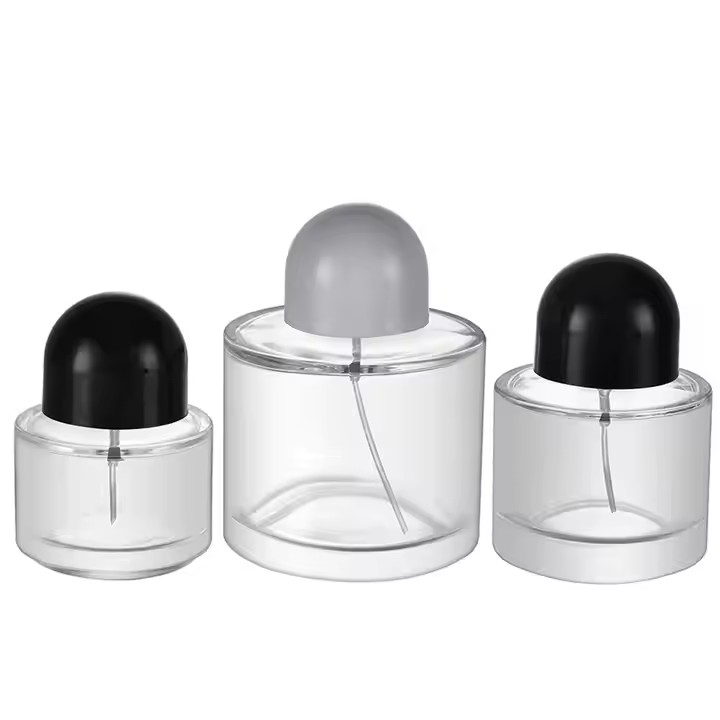Custom Logo Round Perfume Glass Bottles 30 ml 50 ml 100 ml Clear Empty Glass Perfume Bottles With Unique Cap