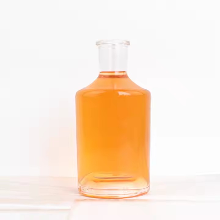 Wholesale Round 700ml Empty Milk Fruit Juice Drink Glass Bottles With White Tamper Proof Cap