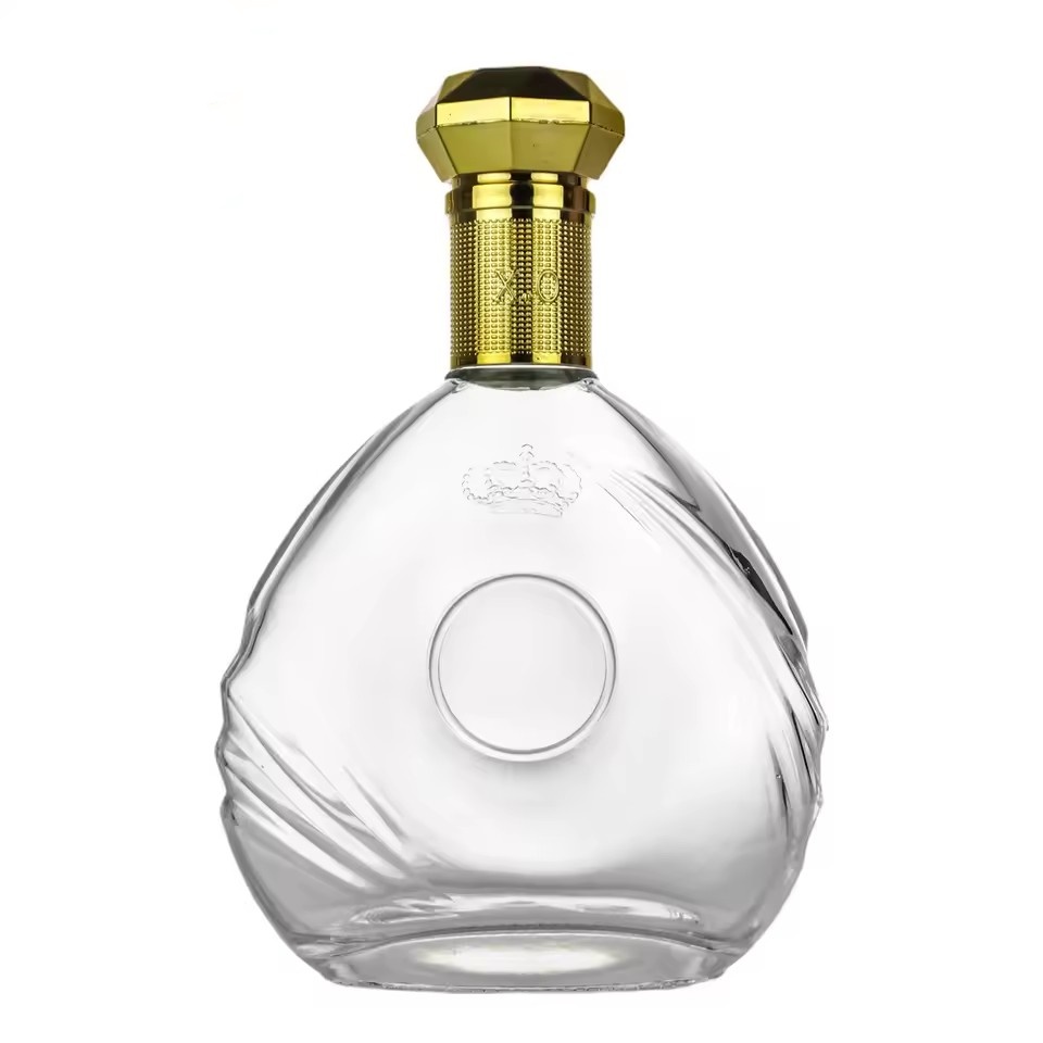 Wholesale 700ml Ornate Flat Round Embossed Crown Bottle for XO Cognac Brandy with Luxury Gold Stopper Empty Spirit Glass Bottle