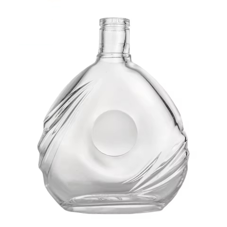 Wholesale Transparent 700ml Glass Bottle for Liquor with Flat Round Shape Suitable for Brandy Whiskey and Vodka