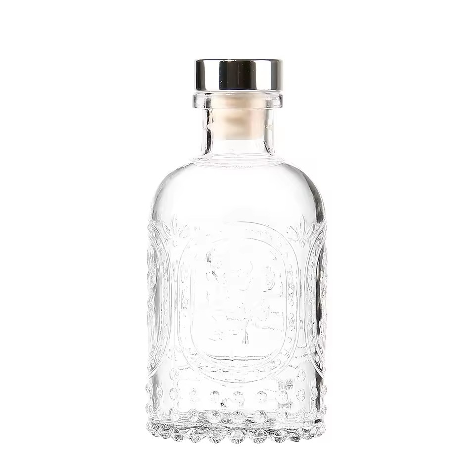 The Crystal Garden Luxury Embossed Transparent 20ml 30ml 50ml 100ml Glass Reed Diffuser Bottle for Hotel Resort Home Decor