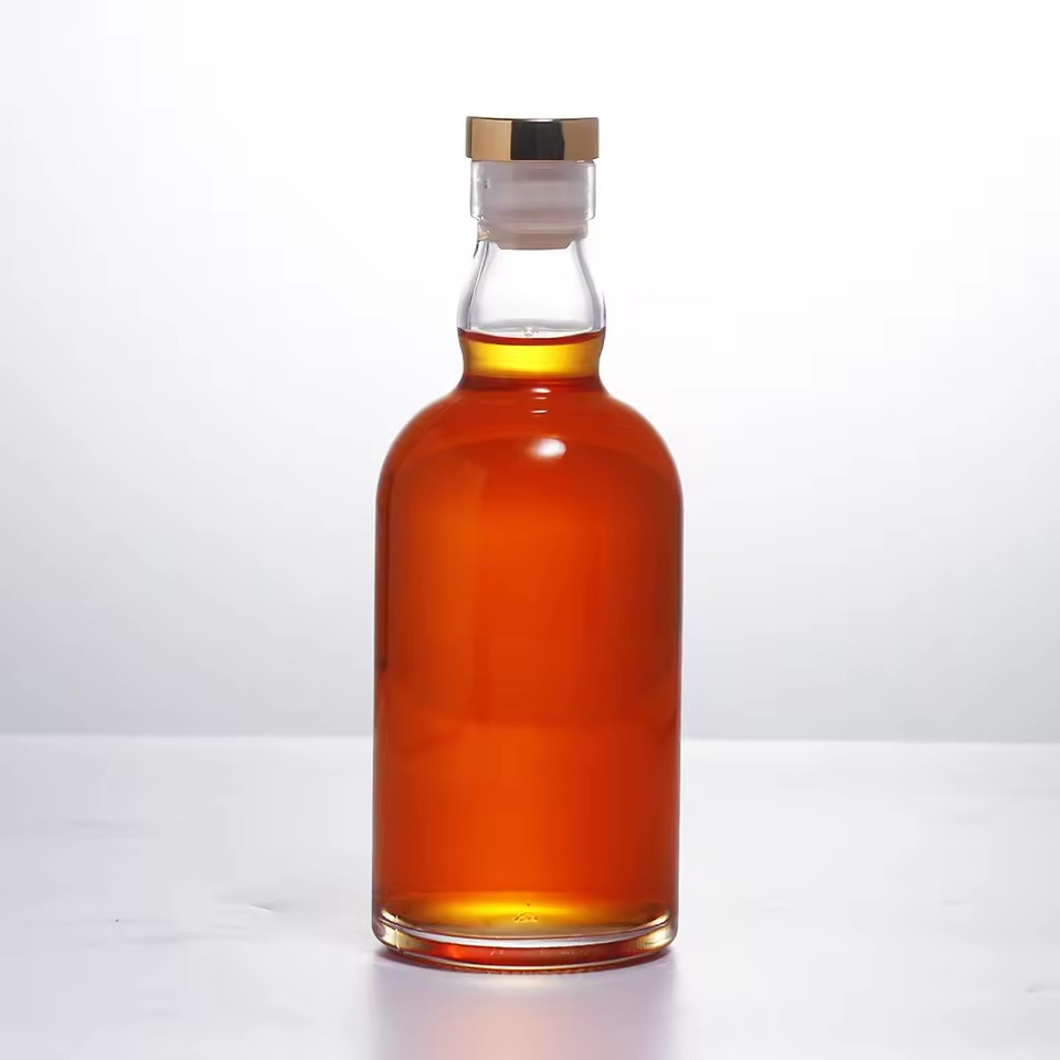 Wholesale Recyclable 330ml Thin Bottomed High-quality Volcanic Flint Transparent Glass Bottle with Cork for Tequila Hot Stamping