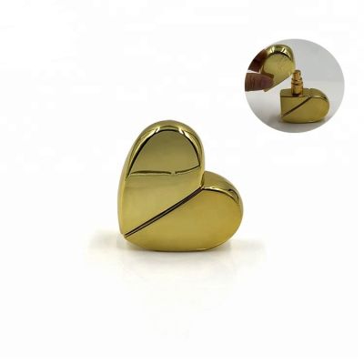 New design 25ml UV heart shaped colored glass perfume bottles 