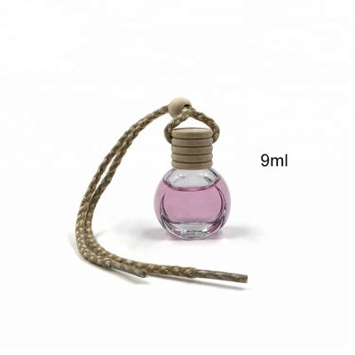 Wholesale 9ml flat round car hanging perfume air fresheners bottle 