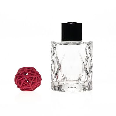 Factory Wholesale 50ml Embossed Glass Vase 1.5oz Decorative Crystal Glass Reed Diffuser Bottle with lid 