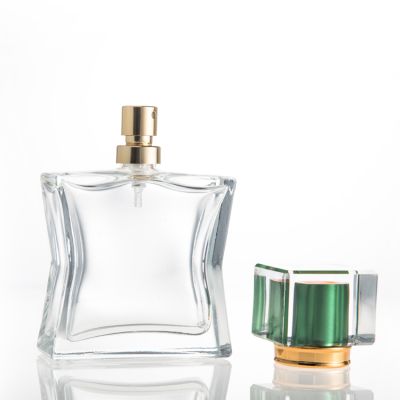 Fancy 55ml Curve Shape Glass Perfume Bottle For Sale With Spray Lid 