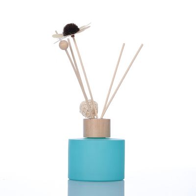 Decorative 200ml 7oz Round Matte Blue Empty Glass Aroma Diffuser Bottle with Rattan Flower