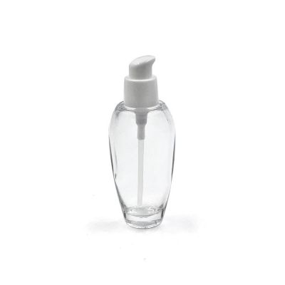 OEM design 60ml oval cosmetic container clear empty glass lotion pump bottle