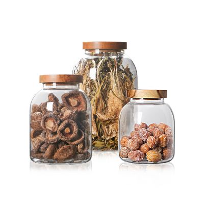 Wholesale Kitchen Storage Container Bottle Large Unique Round Sealed High Borosilicate Glass Food Storage Jar wooden lid 