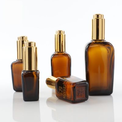 Hot selling 50ml 100ml amber essential oil square glass bottle for cosmetic